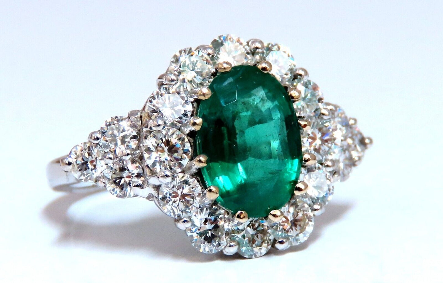 2.47ct GIA certified emerald diamond cluster ring 18kt