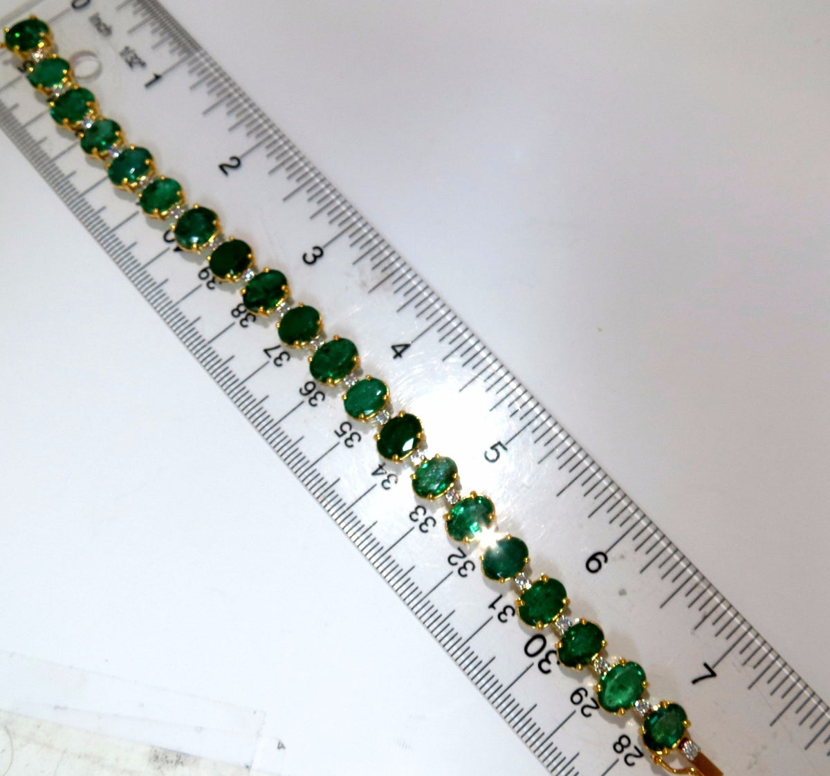 Emerald bracelet 27.42ct & .75ct diamonds classic tennis 14kt. natural greens *v