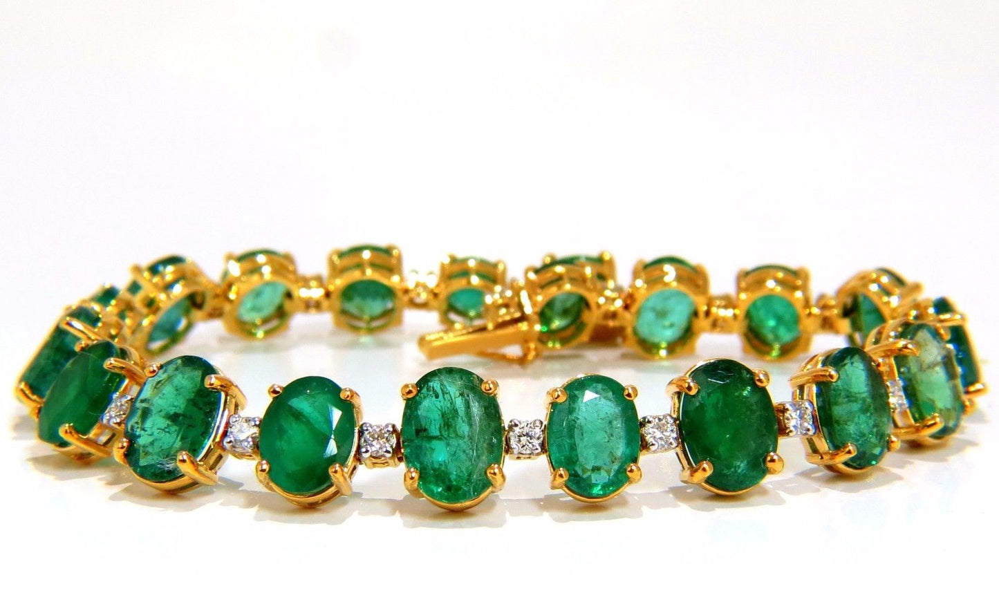 Emerald bracelet 27.42ct & .75ct diamonds classic tennis 14kt. natural greens