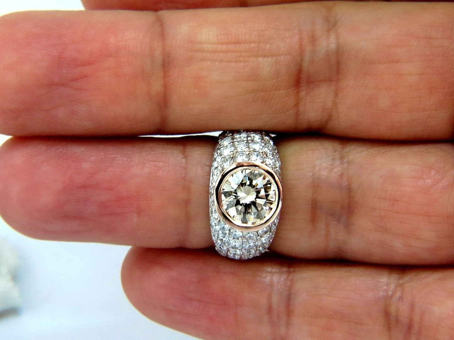 GIA Certified 3.08ct. Fancy light brown round cut diamond ring 14kt