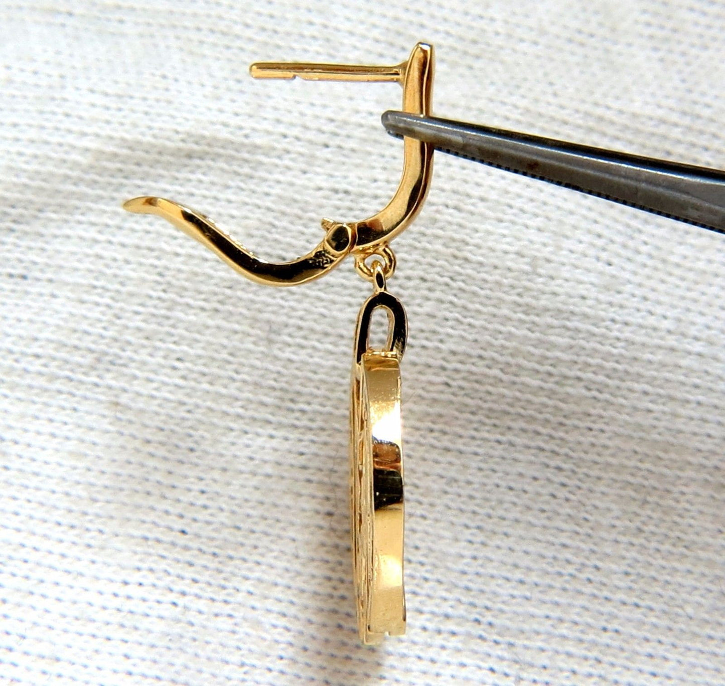 Cosmopolitan Mod X Diamond dangle earrings 14kt