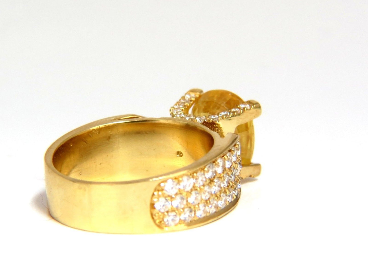 7.06ct Natural yellow sapphire ring 18kt. Raised Bead Set