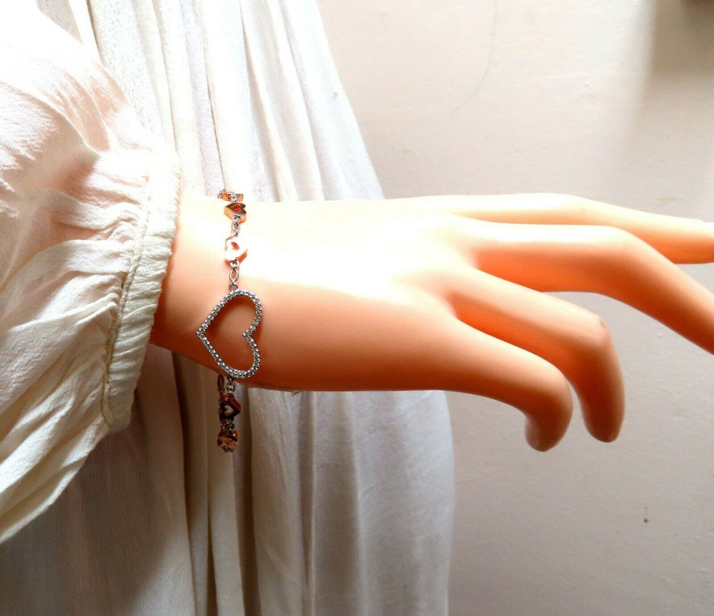 .36 carat natural diamonds wide heart linked bracelet 14 karat two tone