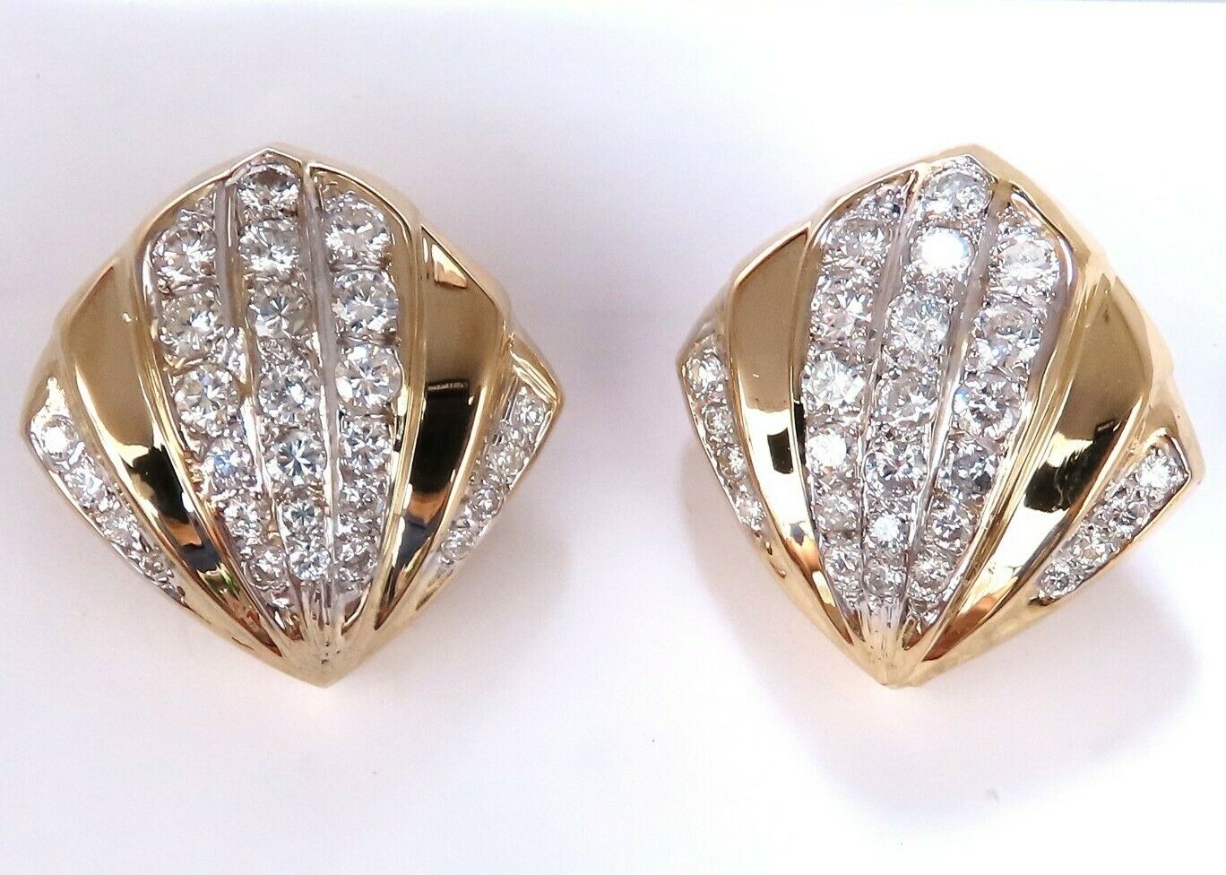 2ct. natural round diamond shell crest clip earrings 14kt