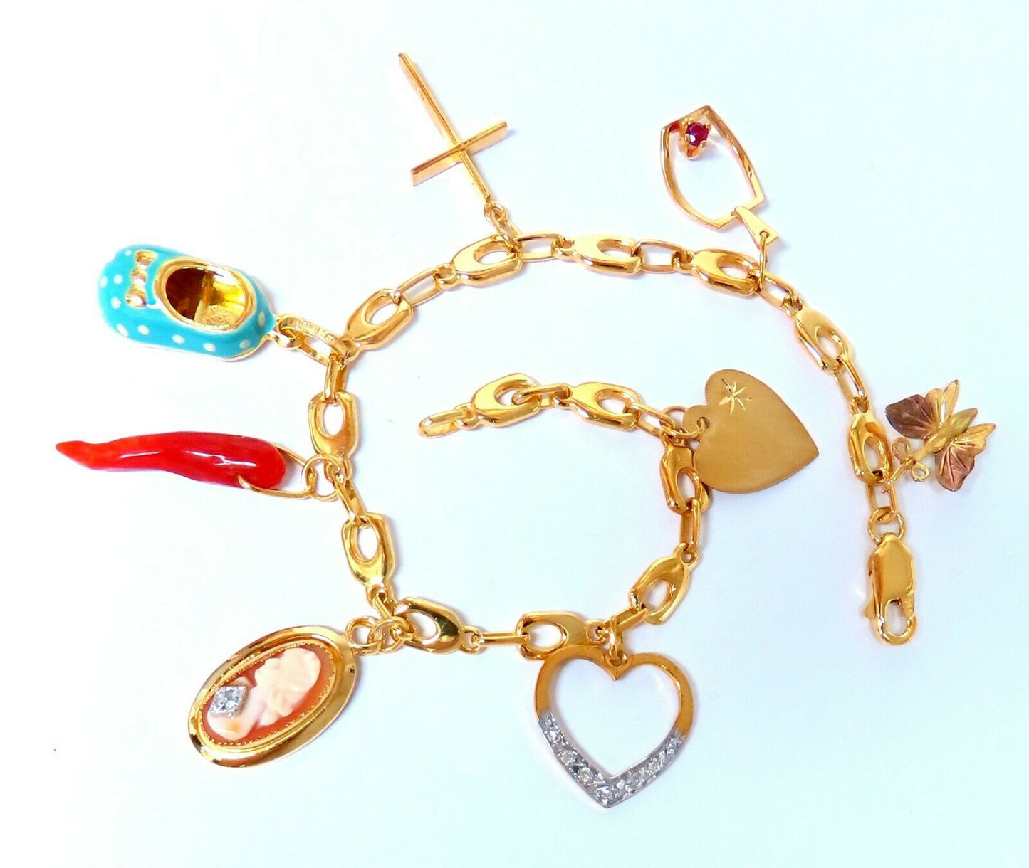 Eight Charms Link Bracelet 14kt gold 7.5 inch 14gm