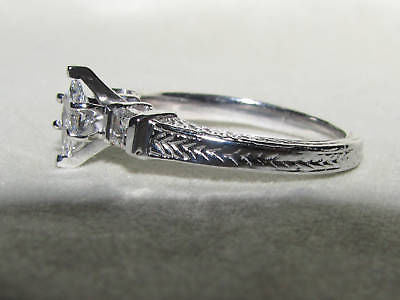 NATURAL .56CT MARQUISE & ASCHER CUT DIAMOND RING