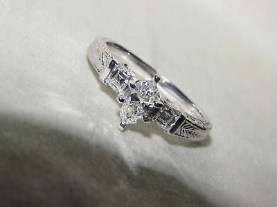 NATURAL .56CT MARQUISE & ASCHER CUT DIAMOND RING