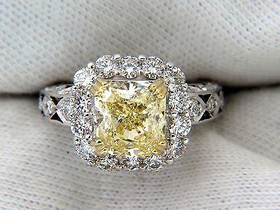 GIA 5.52CT CUSHION NATURAL FANCY YELLOW DIAMOND CLUSTER HALO RING VVS1