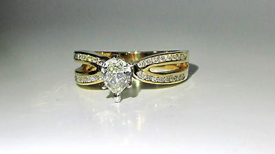 1.02CT PEAR SHAPE DIAMOND RING 14KT MODERN CLASS