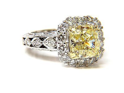 GIA 5.52CT CUSHION NATURAL FANCY YELLOW DIAMOND CLUSTER HALO RING VVS1