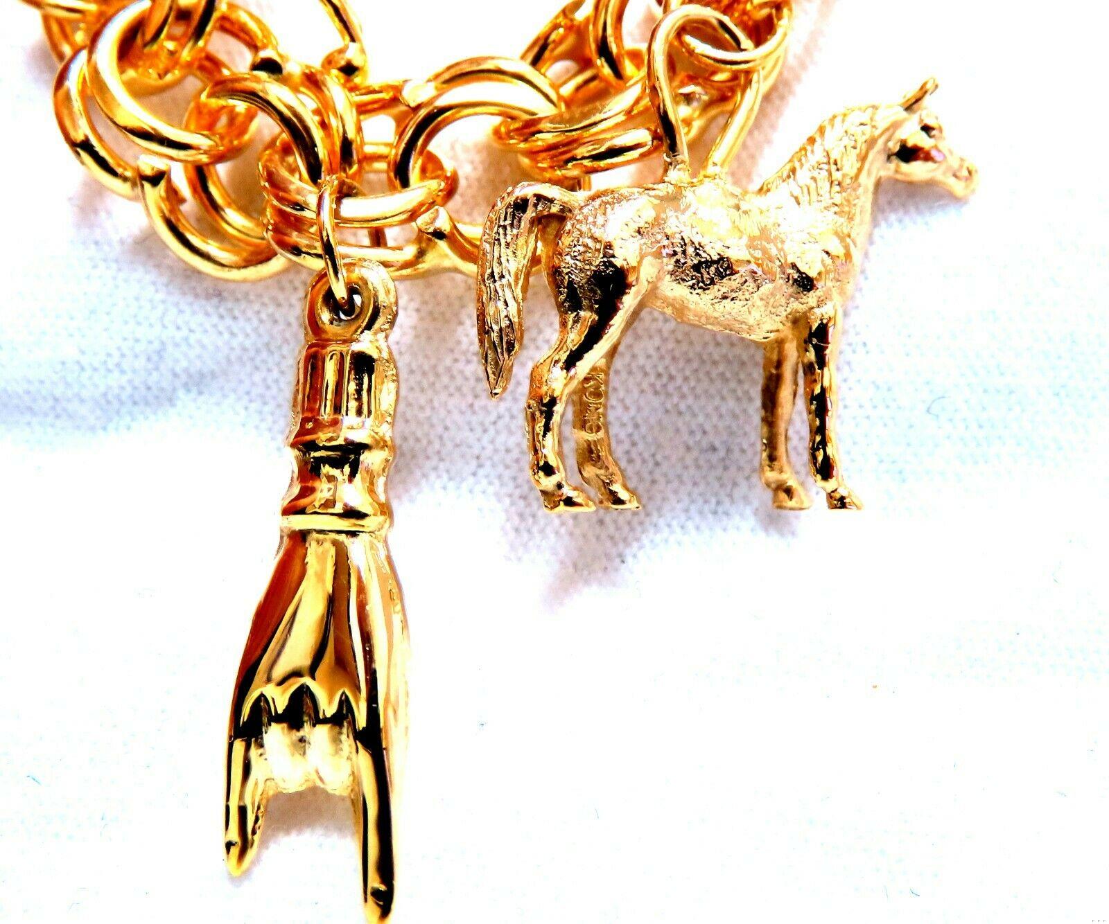 Eight Charms Link Bracelet 14kt gold 7 inch 43gm**