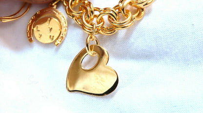 Eight Charms Link Bracelet 14kt gold 7 inch 43gm *v