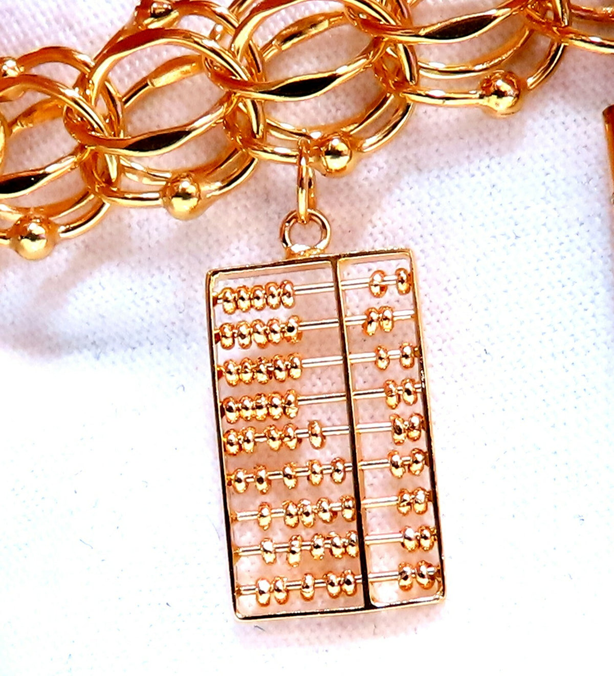Nine Charms Link Bracelet 14kt gold 7 inch 54gm *v