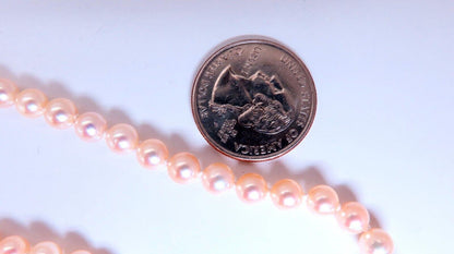 5.5mm freshwater Pearl necklace 14kt gold *v