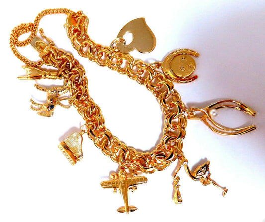 Eight Charms Link Bracelet 14kt gold 7 inch 43gm *v