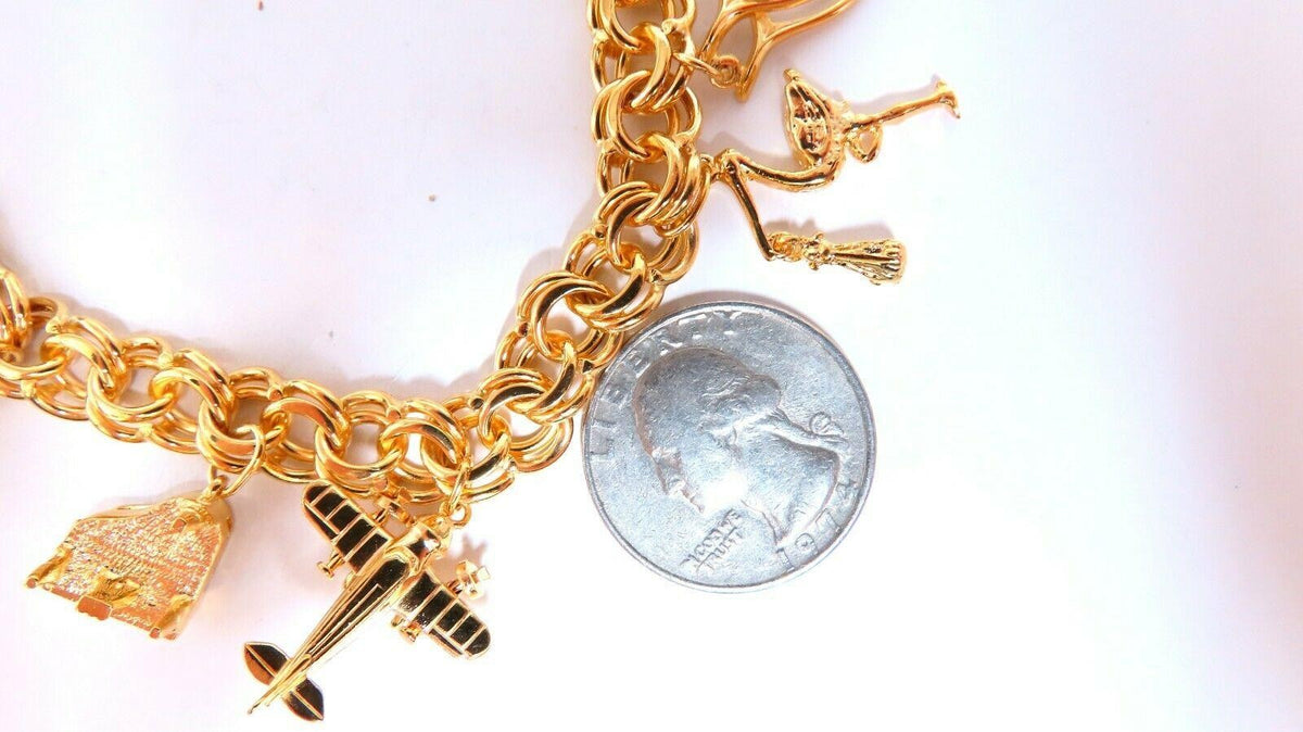 Eight Charms Link Bracelet 14kt gold 7 inch 43gm *v