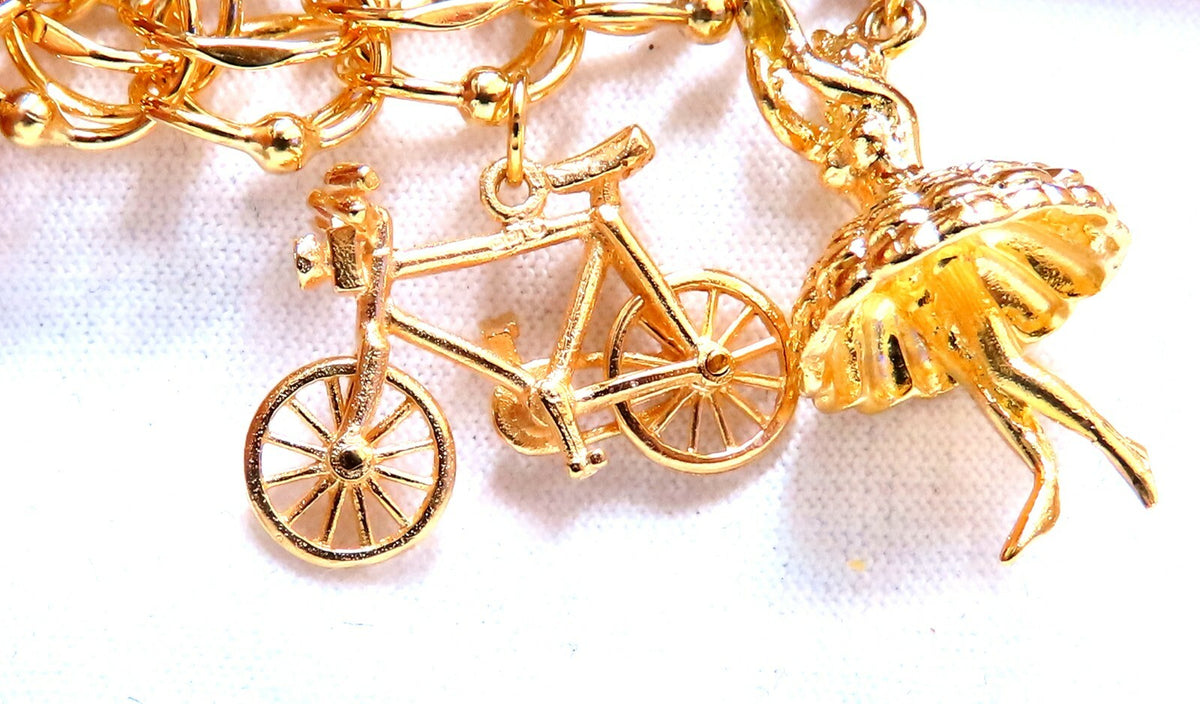 Nine Charms Link Bracelet 14kt gold 7 inch 54gm *v