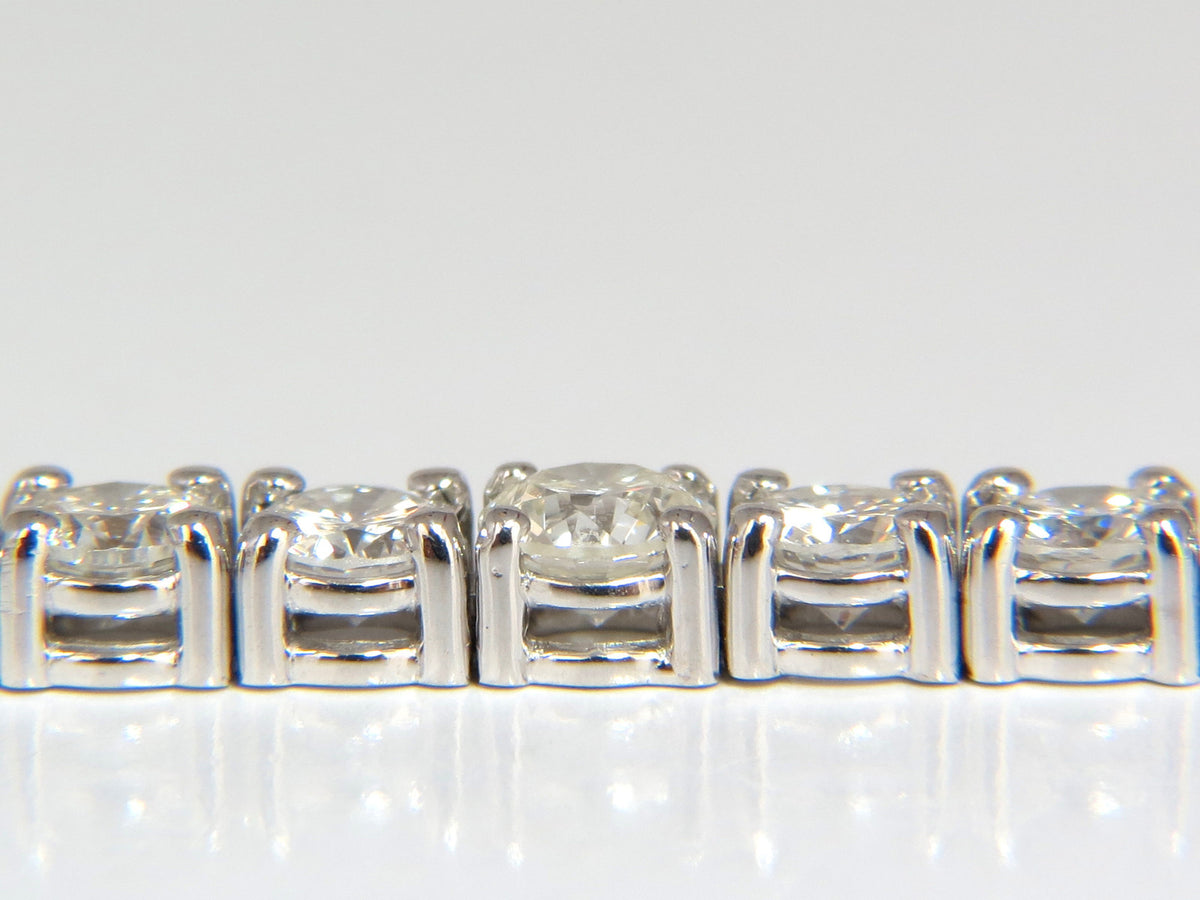 4.26ct natural diamonds graduated tennis bracelet 18kt gold F/G Vs *v