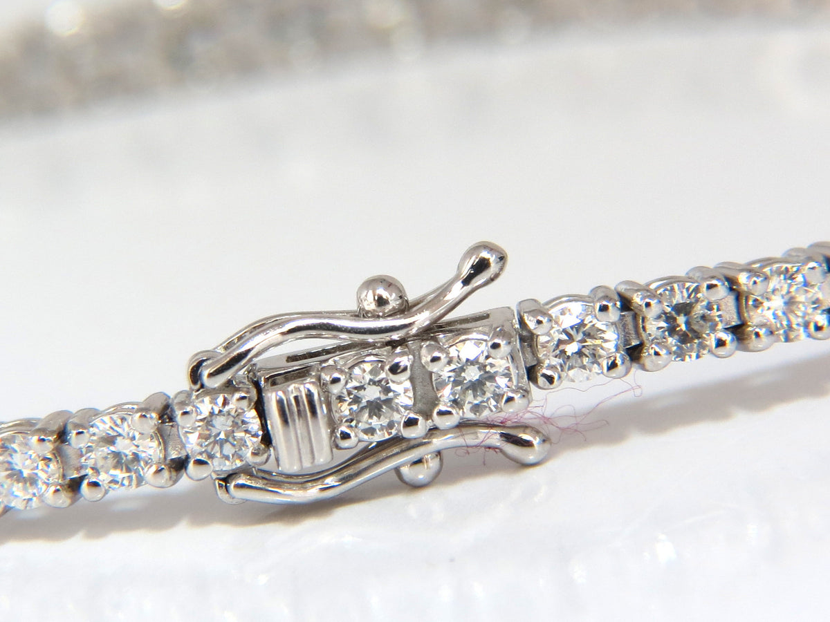 4.26ct natural diamonds graduated tennis bracelet 18kt gold F/G Vs *v