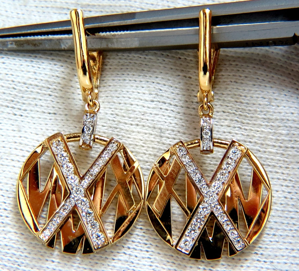 Cosmopolitan Mod X Diamond dangle earrings 14kt *v