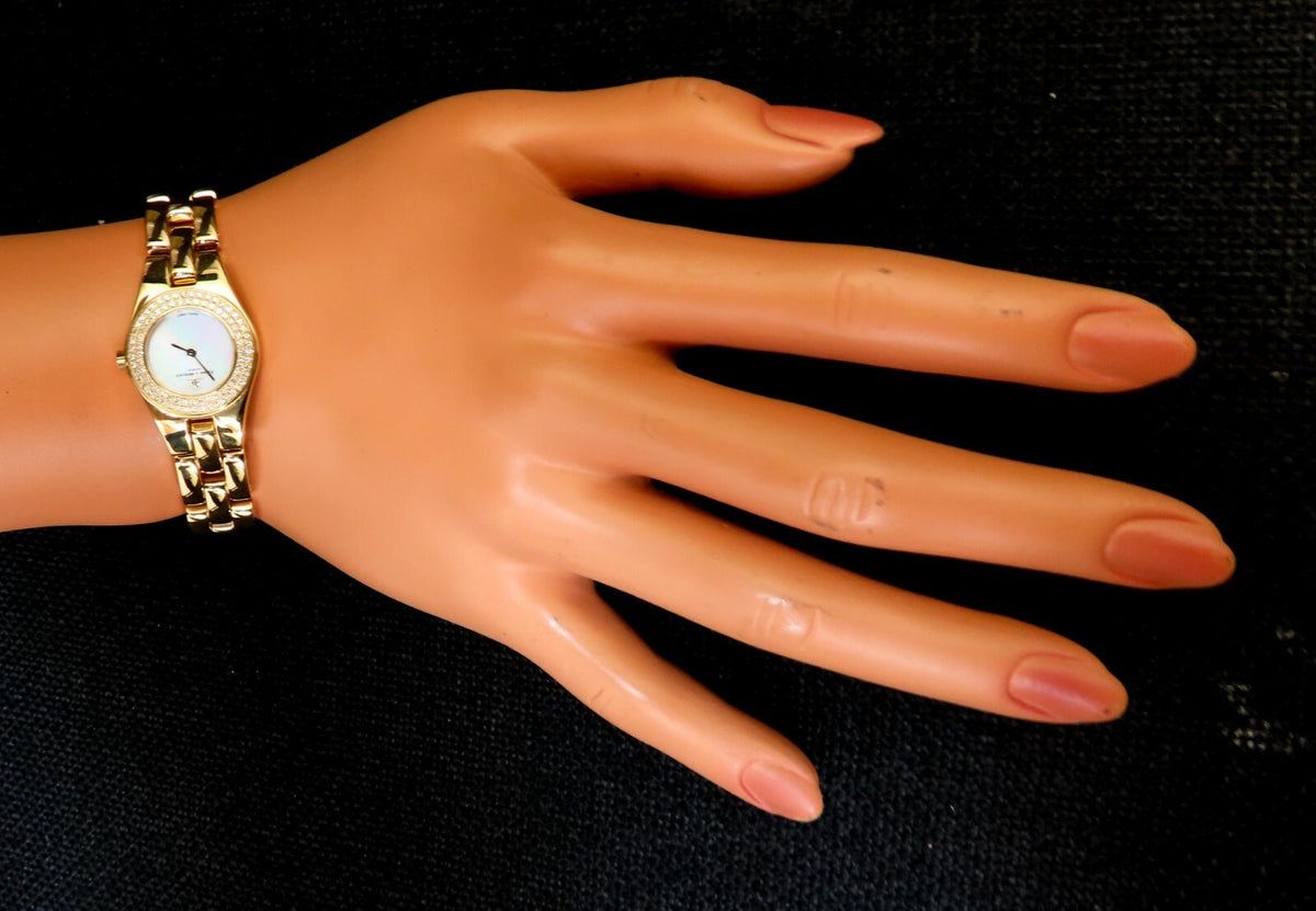 Baume Mercier ladies diamond gold watch 18kt gold *v