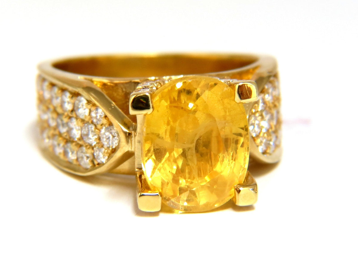 7.06ct Natural yellow sapphire ring 18kt. Raised Bead Set *v