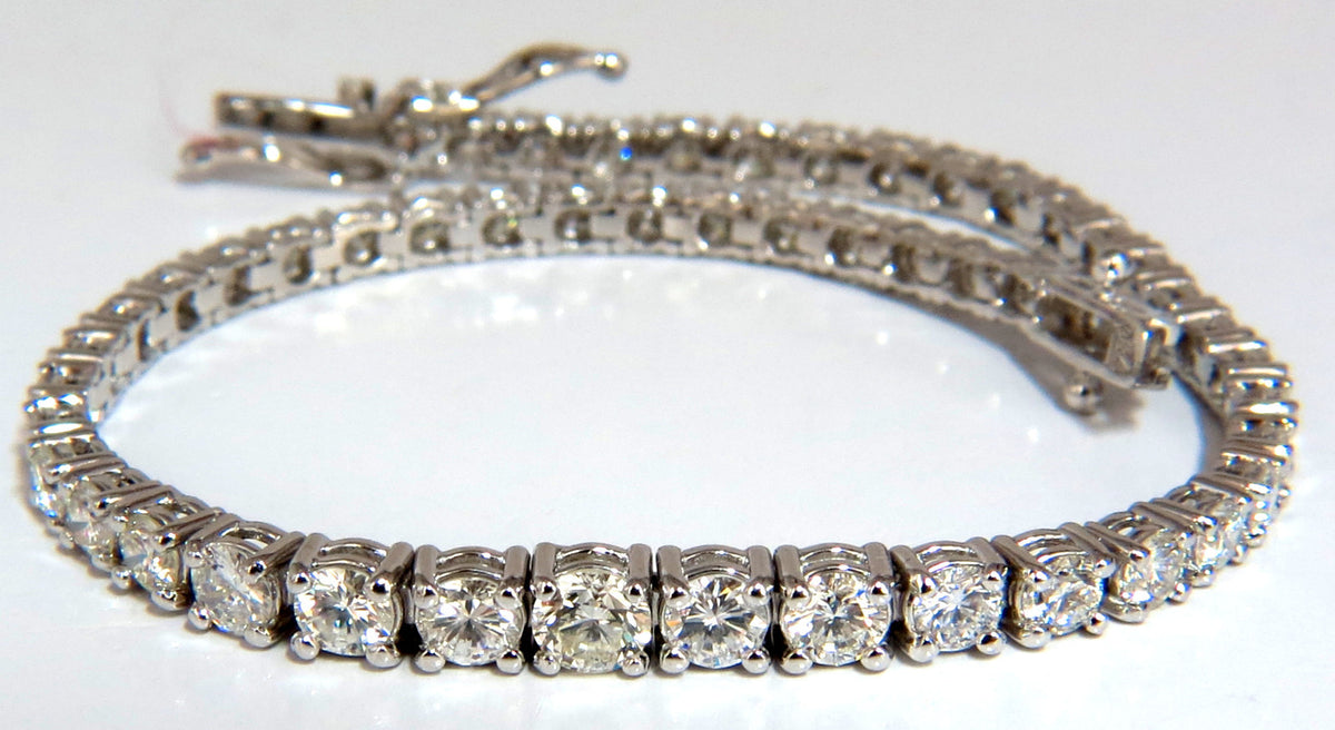 4.26ct natural diamonds graduated tennis bracelet 18kt gold F/G Vs *v
