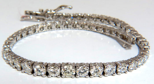 4.26ct natural diamonds graduated tennis bracelet 18kt gold F/G Vs *v