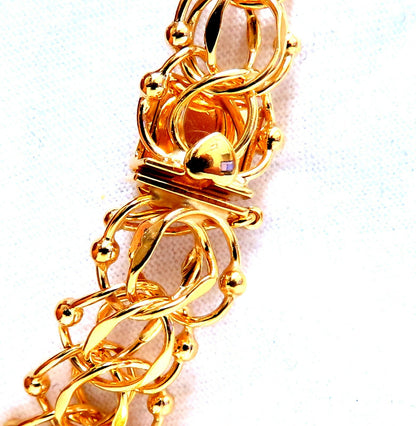 Nine Charms Link Bracelet 14kt gold 7 inch 54gm *v