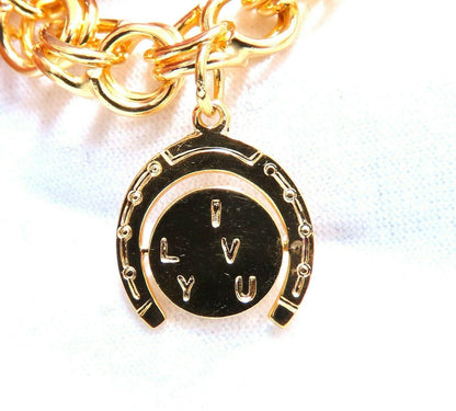 Eight Charms Link Bracelet 14kt gold 7 inch 43gm *v