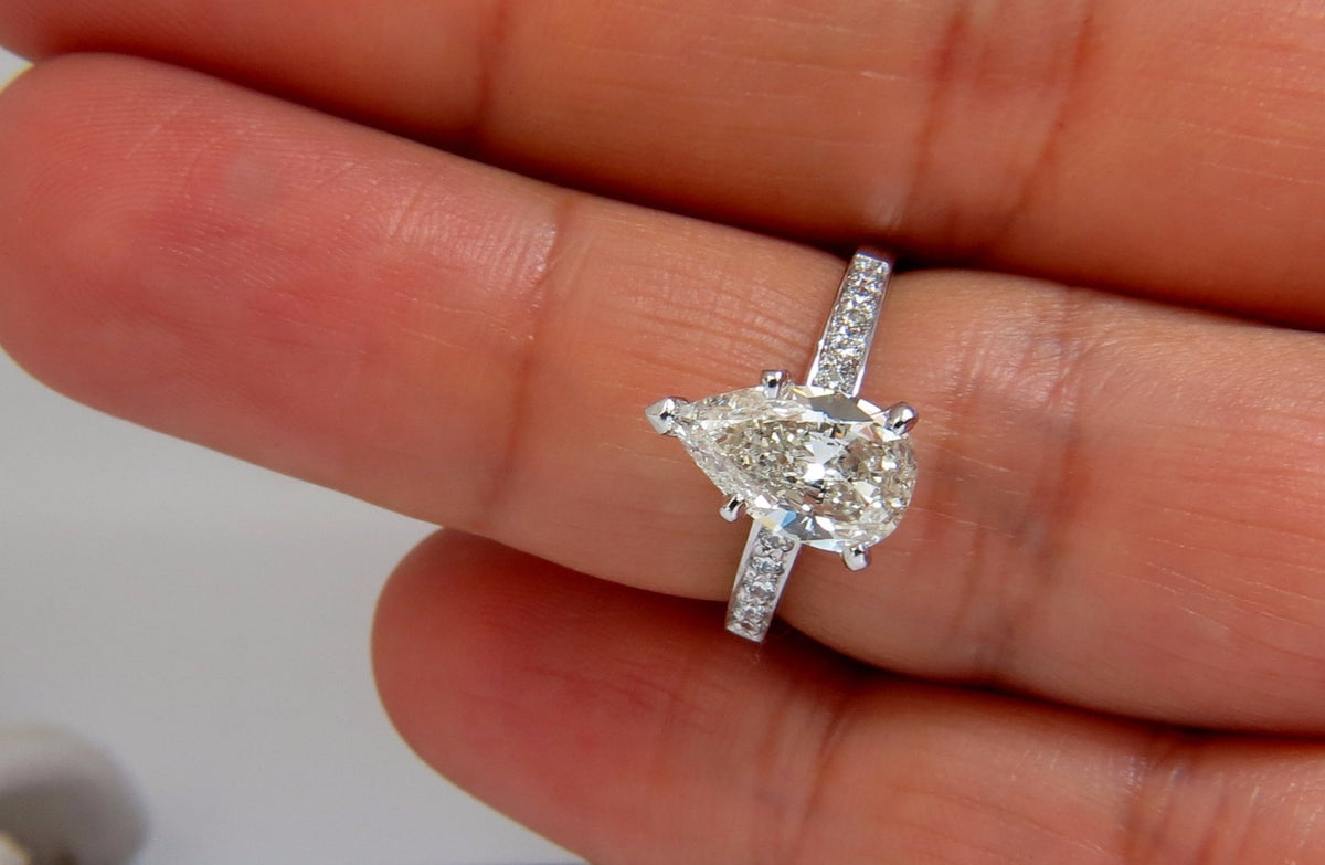 GIA Certified 1.49ct Pear Shape diamond ring .20ct. round accents 14kt *v