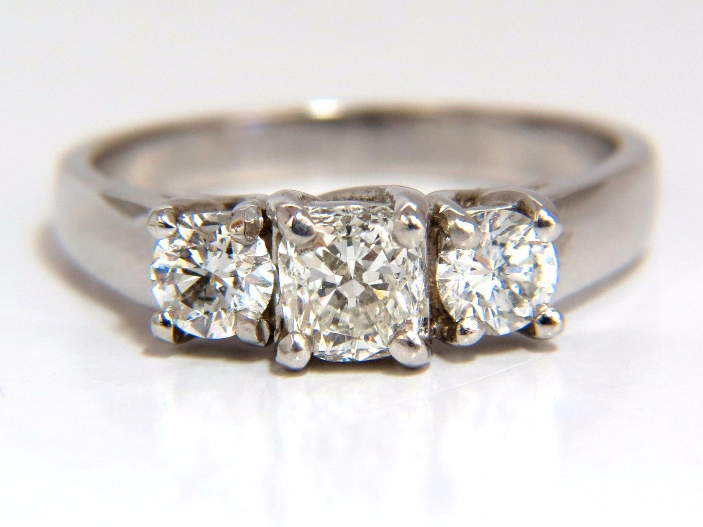 1.08CT CLASSIC THREE NATURAL CUSHION & ROUNDS DIAMOND RING 14KT