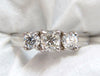 1.08CT CLASSIC THREE NATURAL CUSHION & ROUNDS DIAMOND RING 14KT