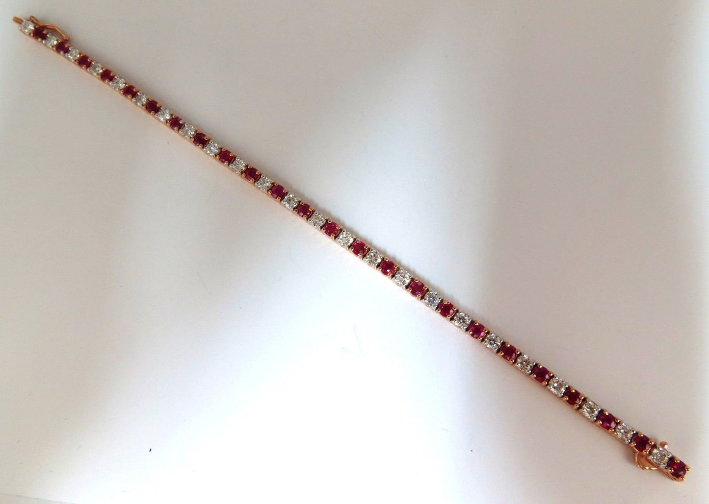 6.51ct vivid red natural ruby diamonds alternating tennis bracelet 14kt