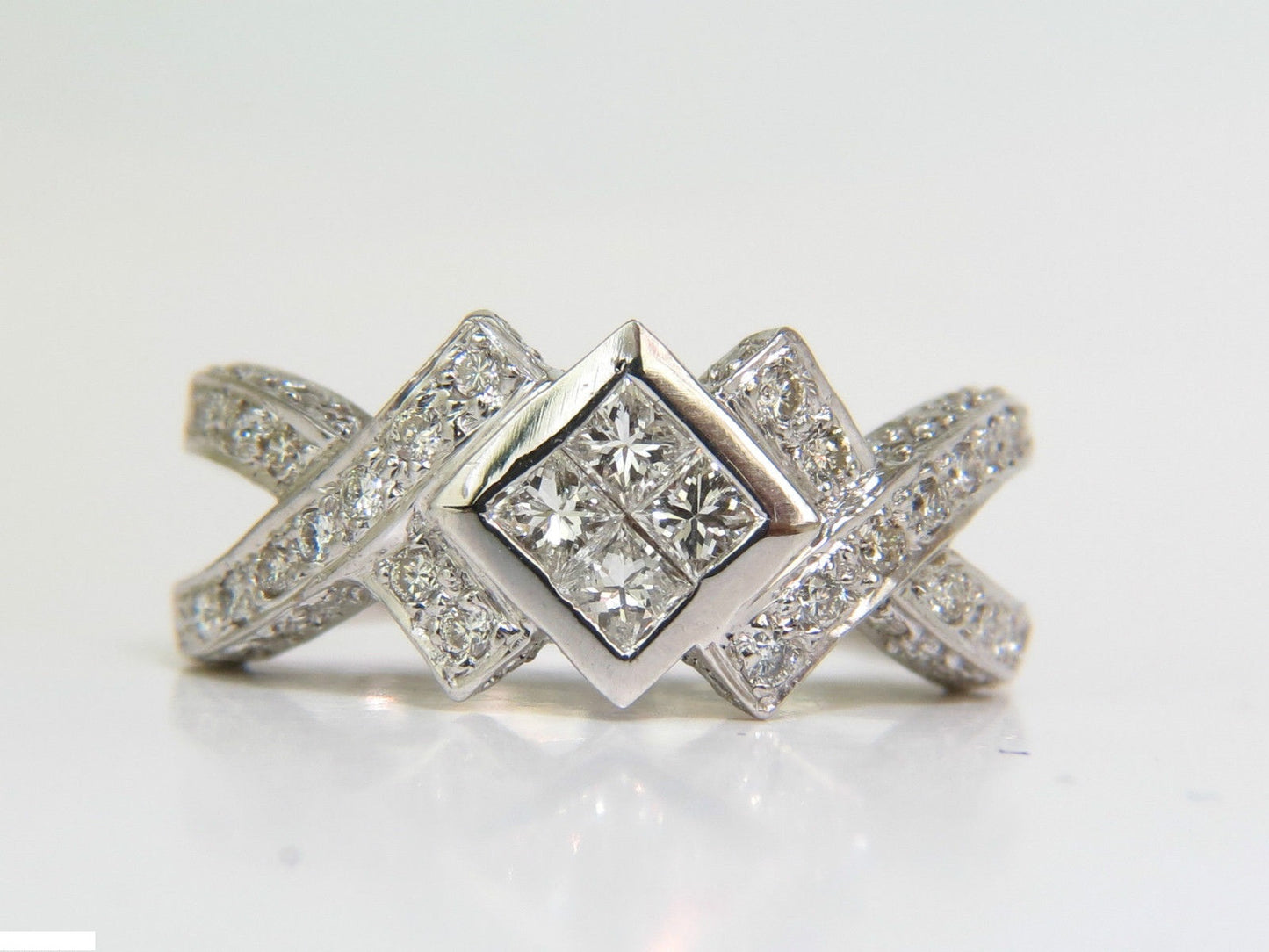 1.00CT CLASSIC PRINCESS CLUSTER & ROUNDS CROSSOVER RING SPLIT SHANK