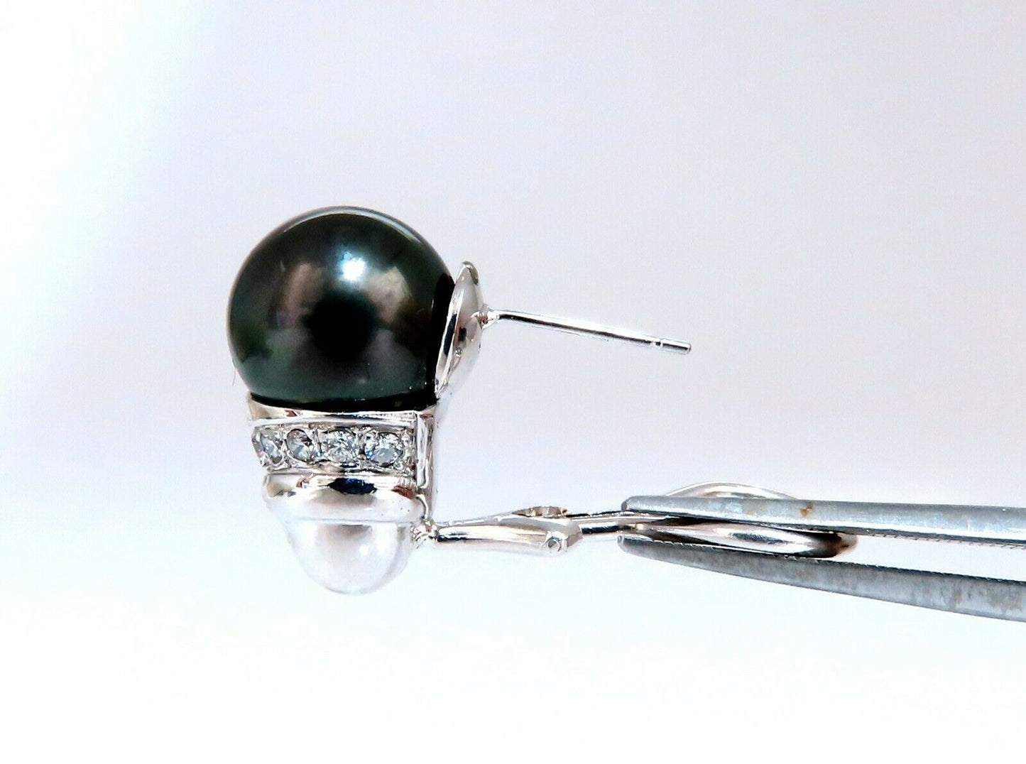 11mm natural tahitian pearl & .50ct diamonds raised cap earrings 14kt