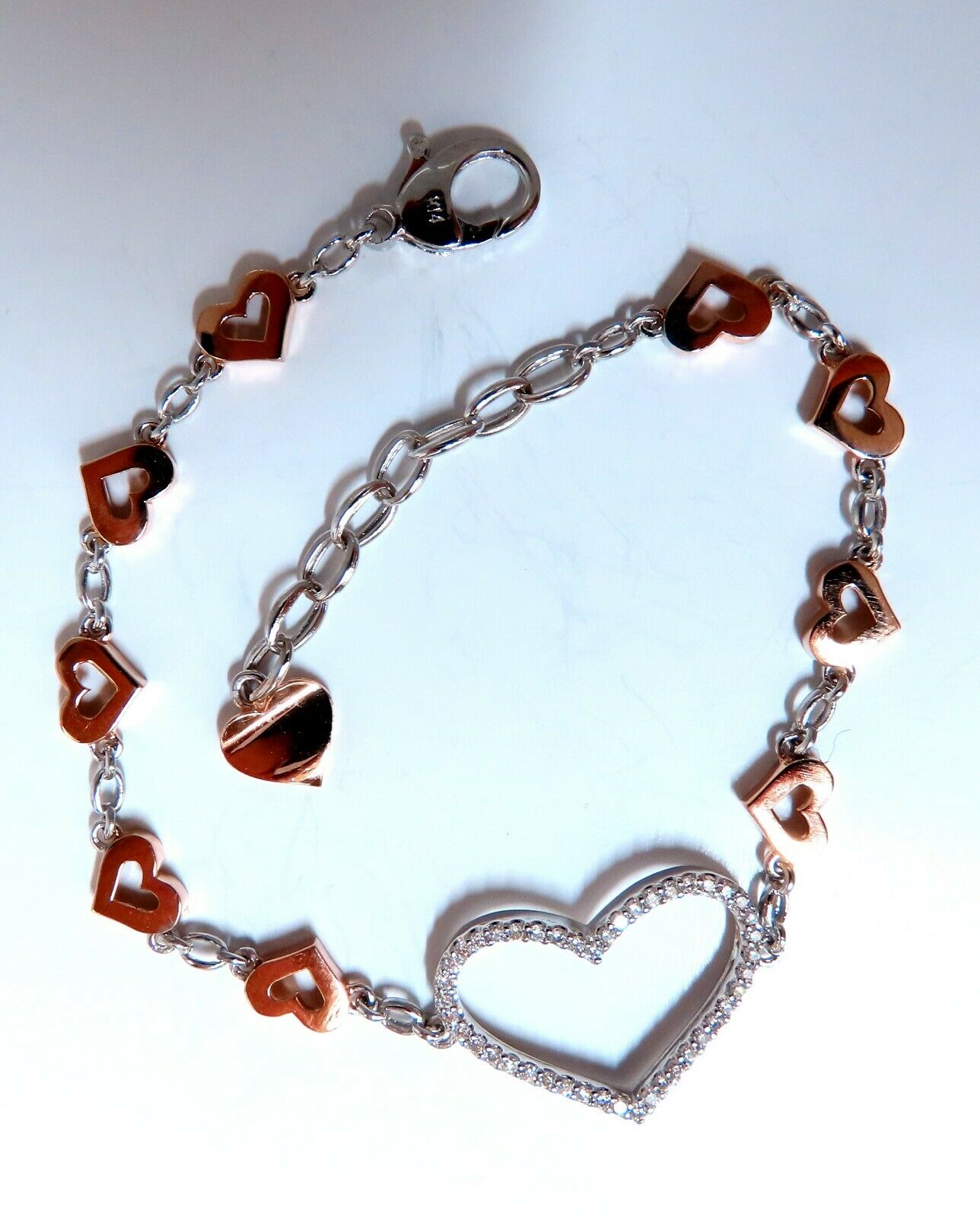 .36 carat natural diamonds wide heart linked bracelet 14 karat two tone