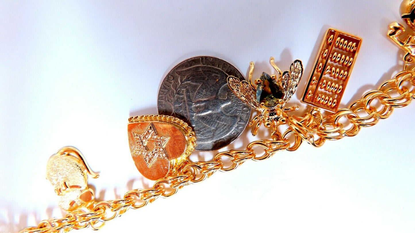 Seven Charms Link Bracelet 14kt gold 7 inch 30gm