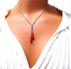 18 mm natural Coral twin bolo form necklace 14 karat