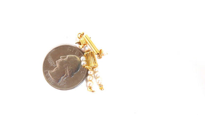 Pearl graduation charm 14kt gold