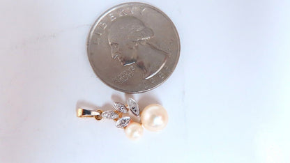 6.5mm 4.5mm pearl diamond pendant 14kt